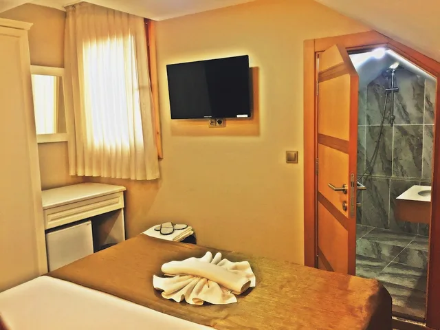 غرفة قياسية مفردة بسرير فردي بإطلالة جزئية على البحر، Feza Otel 4/6