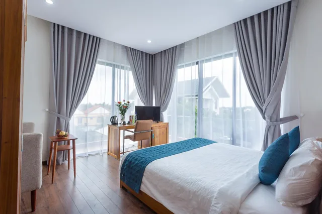 غرفة غراند ديلوكس بسرير كوين بإطلالة على النهر، Hoi An Reverie Villas 1/3