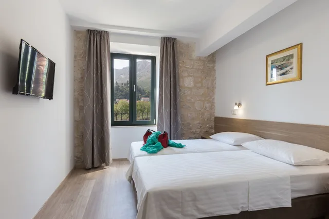 غرفة بسريرين منفصلين بإطلالة على البحر، Hotel Vimbula 2/8