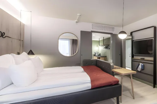 غرفة غراند بسرير كينج، Hotel Norge By Scandic 1/2