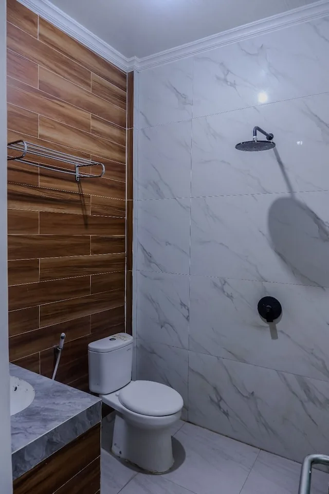 غرفة عائلية بسرير كوين، Hotel Hakmaz Taba Syariah Lubuk Linggau 4/6