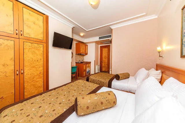 غرفة ثلاثية بسرير كينج وسرير فردي، Santa Ottoman Hotel 2/4