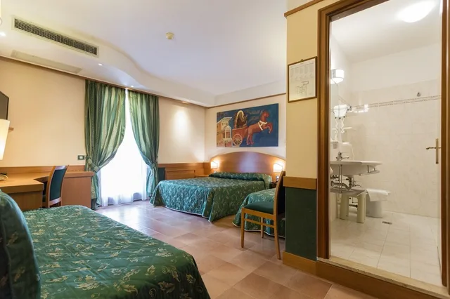 غرفة قياسية رباعية بسرير كوين مع أريكة، Hotel Ristorante La Terrazza 2/8