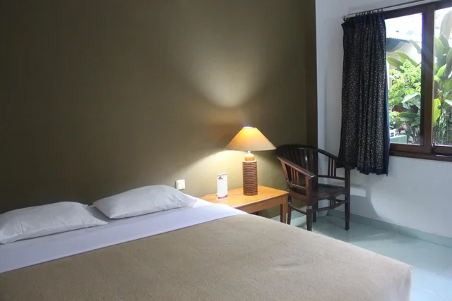 غرفة بسرير مزدوج بشرفة، Hotel Winotosastro Garden 4/8