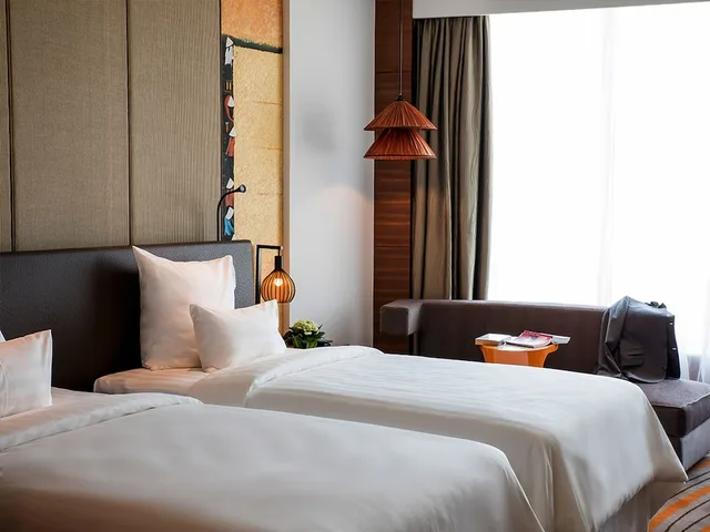 غرفة تنفيذية بسريرين منفصلين مع دخول صالة النادي، Pullman Vung Tau 1/9