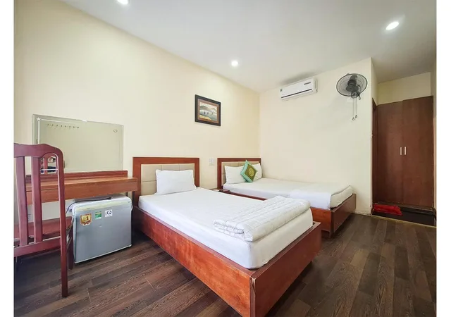 غرفة ثلاثية بسرير كوين وسرير فردي، QUAN QUAN HOTEL 4/7
