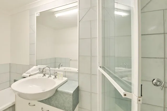 شقة بأربعة أسرّة وثلاثة أسرّة وسرير كوين، Centrepoint Holiday Apartments 4/5