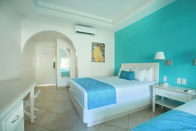 غرفة عائلية بسريرين كوين بإطلالة على المسبح، Tamarindo Diria Beach Resort 5/9