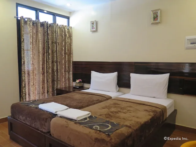 غرفة ديلوكس بسريرين منفصلين، Rovic Apos S Tourist Hotel 1/3