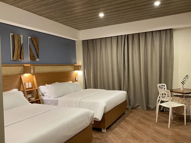 غرفة بريميوم بسريرين كوين بحمام خاص، Acacia Garden Inn 1/1
