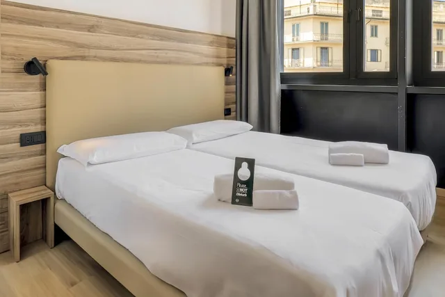 غرفة قياسية بسريرين منفصلين، B&B HOTEL Prato City Center 2/7
