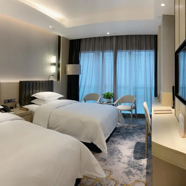 غرفة ديلوكس بسريرين منفصلين بإطلالة على المدينة للمدخنين، Grand Metropark Hotel Liyuan Chongqing 2/6