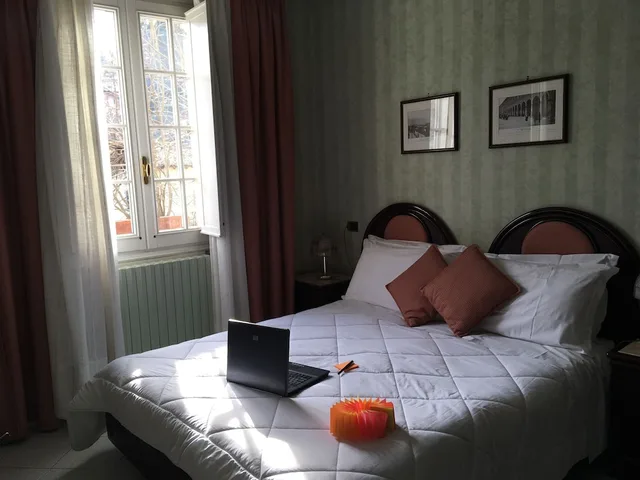 غرفة قياسية بسرير مزدوج أو سريرين منفصلين، Albergo Sapori 1/4