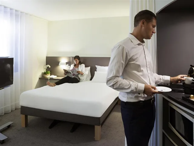 جناح تنفيذي بسرير مزدوج مع أريكة، Novotel Suites Paris Stade De France 7/10