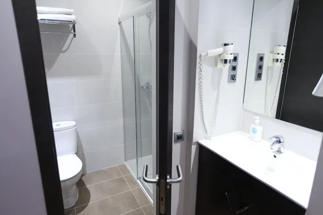 غرفة بسريرين منفصلين، Hostal Las Flores 3/6