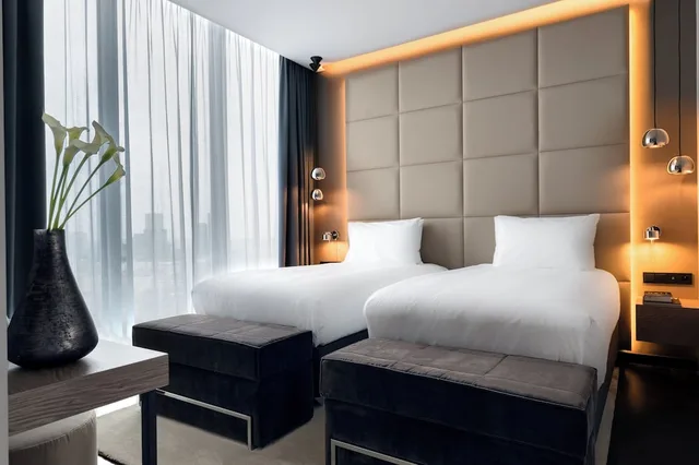 جناح بسرير فردي بإطلالة على المدينة بغرفتي نوم مع دخول صالة النادي في الطابق العلوي، Crowne Plaza Warsaw - The HUB 2/7