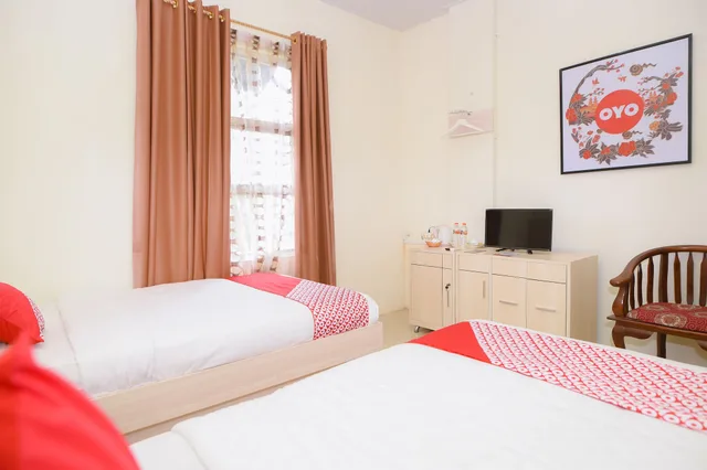غرفة ديلوكس بسريرين منفصلين، Hotel Capital O 854 Ub Caisar Hotel 4/4