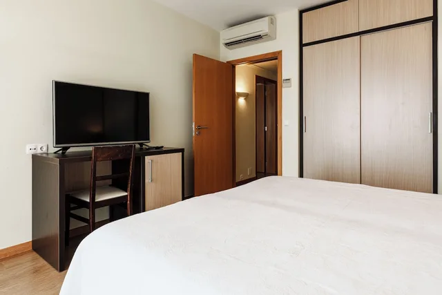غرفة عائلية بسرير مزدوج بإطلالة على الحديقة مع أريكة، Garajau Madeira Hotel - Ocean & Nature Apartments 2/3