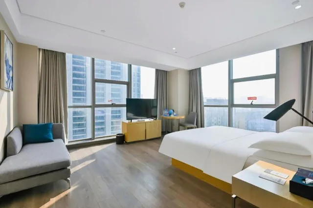 Echarm Hotel (Yangzhou Jiangdu Jinying Plaza Branch)، يانغتشو 24/58