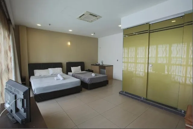 غرفة سوبيريور عائلية بسرير كوين وسرير فردي، T Hotel Jalan Tar 2/3