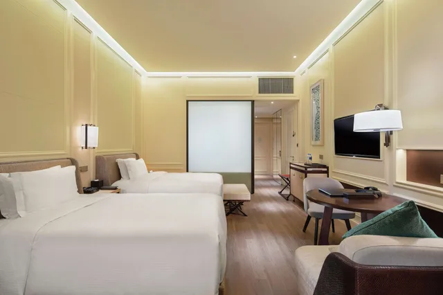 غرفة ديلوكس بسريرين منفصلين بإطلالة على البحر، Hilton Dalian Golden Pebble Beach Resort 2/4