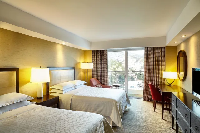 غرفة كلوب بسريرين مزدوجين بإطلالة جزئية على البحر، Sheraton Grand Rio Hotel & Resort 2/7