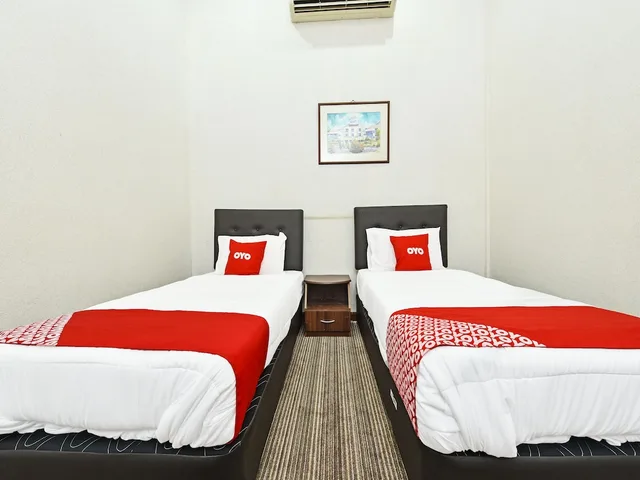 غرفة ديلوكس بسريرين منفصلين، Capital O 90434 Marmoris House 1/2