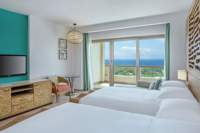 غرفة بسرير كينج بإطلالة على البحر بشرفة، SHERATON SANYA HAITANG BAY RESORT 3/6