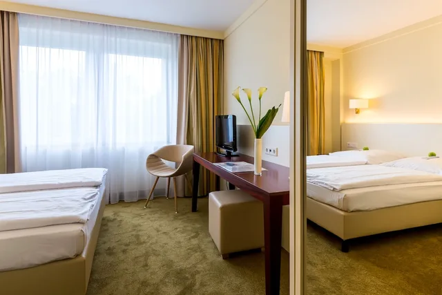 غرفة قياسية بسرير مزدوج أو سريرين منفصلين، relexa hotel Stuttgarter Hof 2/3