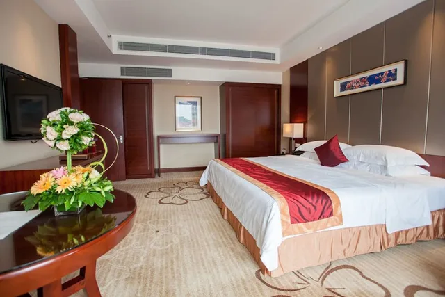 غرفة بسرير كينج بإطلالة على المدينة، Ramada Plaza by Wyndham Shaoguan City Centre 4/5