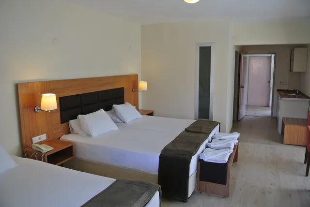جناح بثلاثة أسرّة بغرفة نوم واحدة مع أريكة، Begonville Hotel 6/10