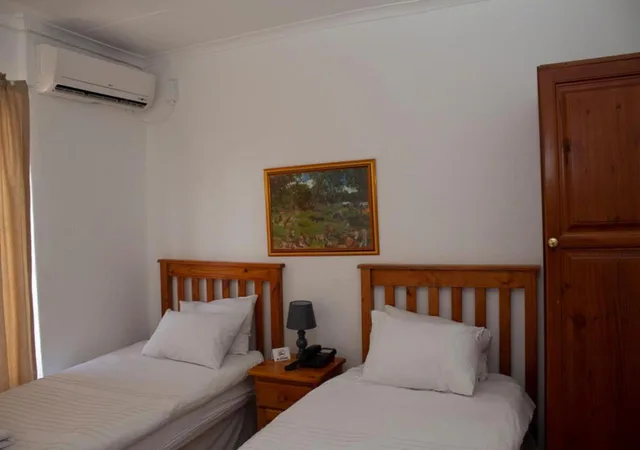 غرفة قياسية بسرير كوين، Sand River Resort 1/3