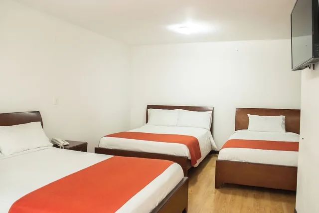 غرفة ثلاثية بثلاثة أسرّة، Nogal Suite Hotel Pasto 2/7
