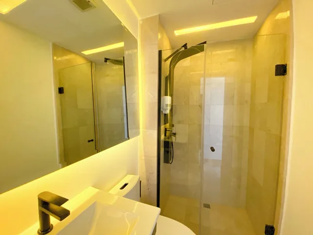 شقة ديلوكس بسريرين مزدوجين بإطلالة على المسبح بشرفة بغرفتي نوم مع أريكة، Xeliter Cana Rock Punta Cana 7/7