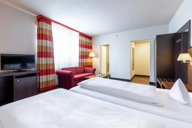 غرفة عائلية بسرير فردي، Trip Inn Frankfurt Nordwestzentrum 1/4