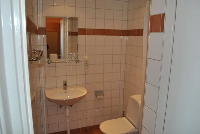 غرفة ثلاثية بثلاثة أسرّة، Slagsta Hotell & Wardshus 3/3