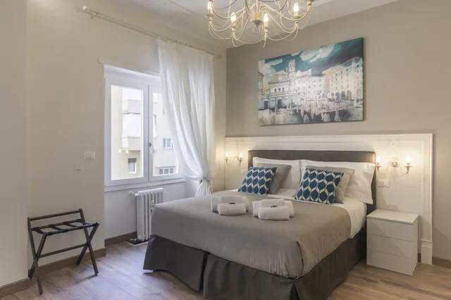 غرفة ديلوكس عائلية بسرير كوين وسرير فردي، Trastevere Gallery Suites 1/4