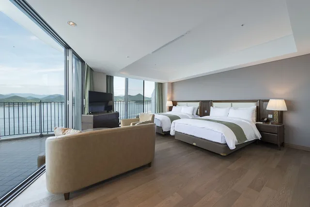 غرفة ديلوكس بسريرين منفصلين بإطلالة على البحر، Stanford Hotel & Resort Tongyeong 1/2
