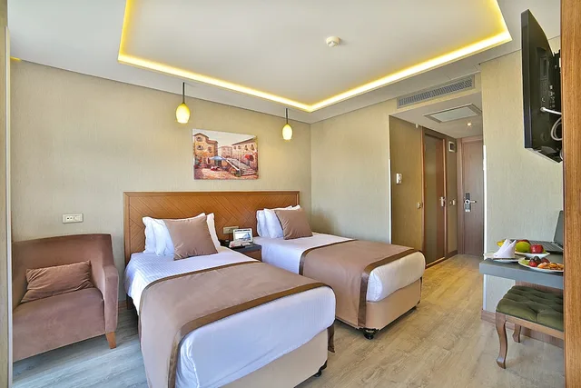 غرفة قياسية بسرير مزدوج أو سريرين منفصلين، Corner Hotel 5/6