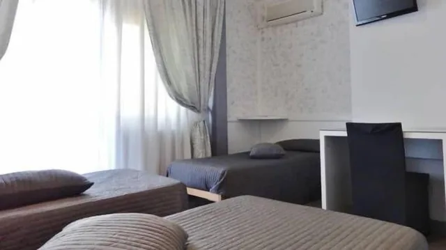 غرفة ثلاثية بسرير مزدوج وسرير فردي، Hotel Marte 4/5