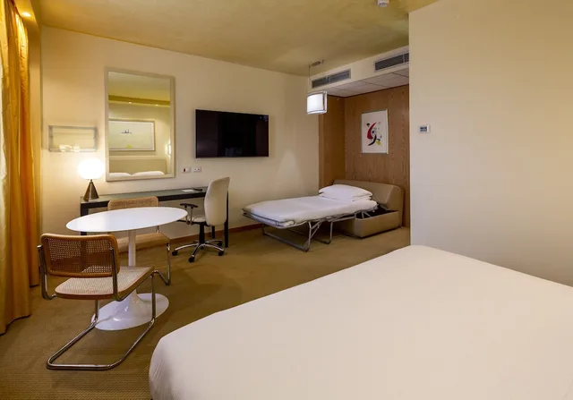 غرفة قياسية بسرير كينج مع أريكة، Crowne Plaza Padova 10/10