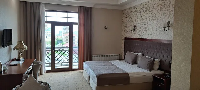 Comfort, Quadruple, 4 Beds, Capitol Hotel 2/7