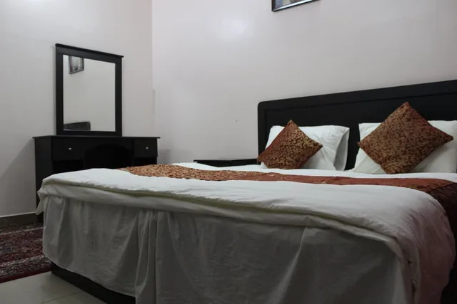 شقة بسرير مزدوج وسريرين منفصلين بغرفتي نوم، العييري للوحدات السكنية 2(Al Eairy Furnished Apartments Al Bahah 2) 5/10