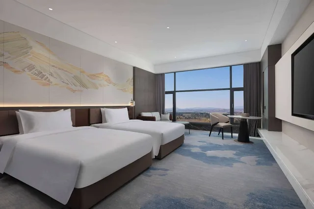 غرفة ديلوكس بسريرين منفصلين مع أريكة، Wyndham Qujing Luliang 1/1
