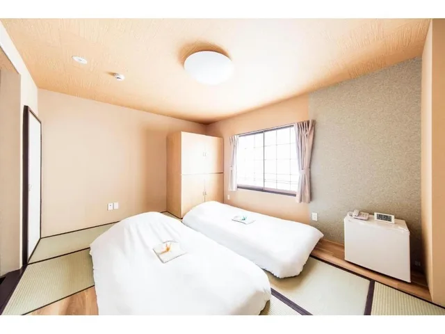 غرفة يابانية بثلاثة أسرّة، Best Hotel 1/1