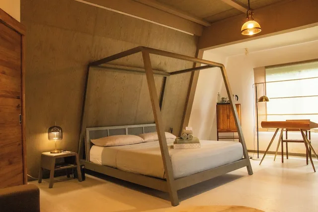 غرفة بريميوم بسرير كينج مع أريكة، Asmara Urban Resort and Lifestyle Village Powered by ASTON 1/2