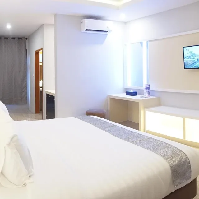 غرفة ديلوكس بسرير كينج بإطلالة على الحديقة، Grand Harvest Resort and Villas 4/10