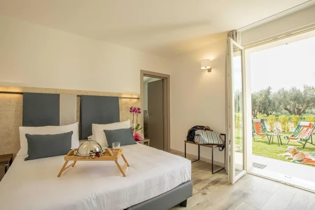 غرفة قياسية بسرير مزدوج أو سريرين منفصلين في الملحق، Riva Toscana Golf Resort & SPA 3/4