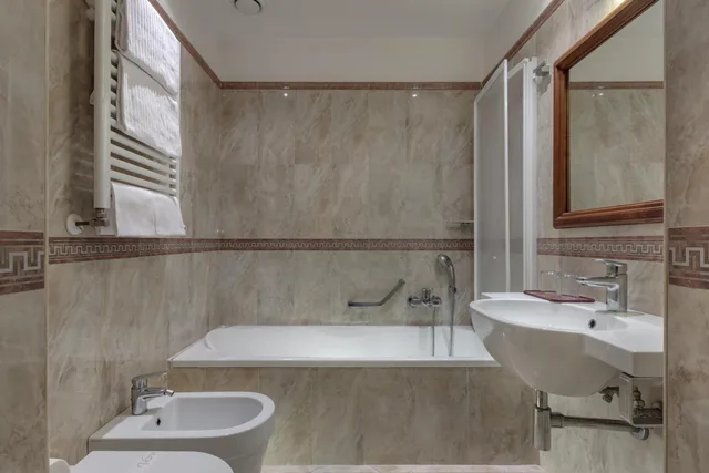 غرفة رباعية، Hotel Borromeo 5/7