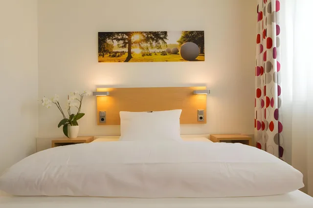 غرفة كومفورت مفردة بسرير كوين، TOP KHR Stadthotel Munster 3/4